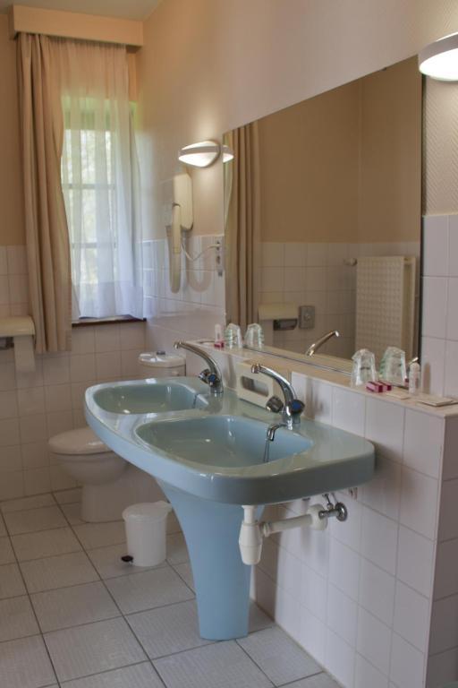 Tromcourt Hotel Couvin Quarto foto